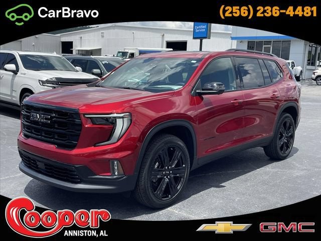 2026 GMC Acadia Elevation in Volcanic Red Tintcoat — front three-quarter view