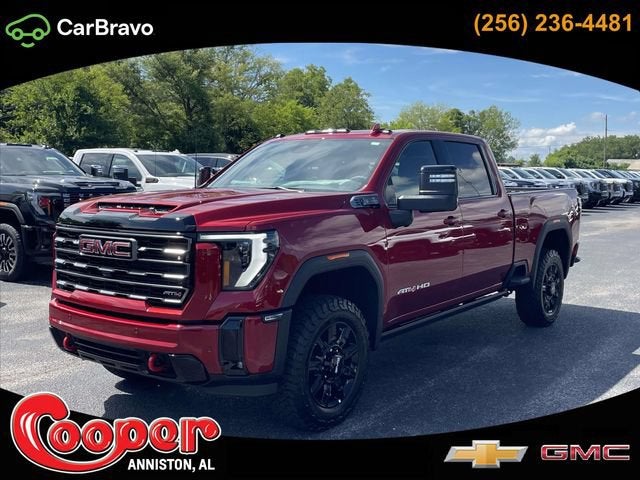 2026 GMC Sierra 2500 HD AT4 in Volcanic Red Tintcoat — front three-quarter view