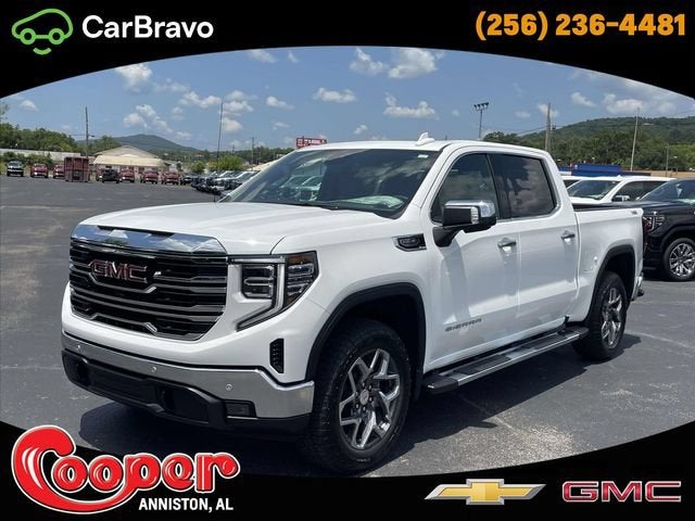 2026 GMC Sierra 1500 SLT in Summit White — front three-quarter view